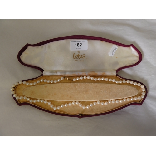182 - String of synthetic pearls with 9ct gold snap, in fitted box by Lotus de Luxe.