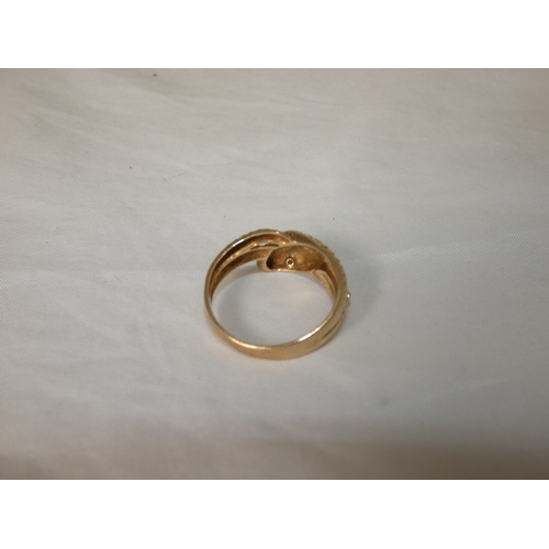 192 - 9ct gold snake ring, '375', with red gem-set eyes, size T/U, 4.3g gross.