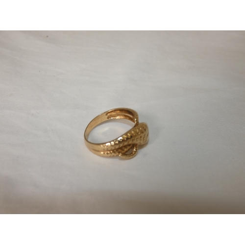 192 - 9ct gold snake ring, '375', with red gem-set eyes, size T/U, 4.3g gross.