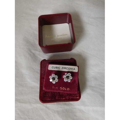 194 - Three pairs of ladies' earrings to include cubic zirconia examples, unmarked, possibly on gold, boxe... 