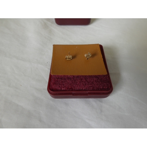 194 - Three pairs of ladies' earrings to include cubic zirconia examples, unmarked, possibly on gold, boxe... 