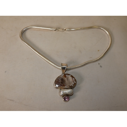 201 - Contemporary agate, mother of pearl and gem-set pendant, mounted in silver, on silver 915 chain, sil... 