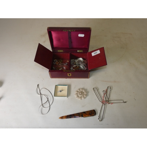 202 - Collection of decorative jewellery and badges to include military-themed badges and buttons, British... 