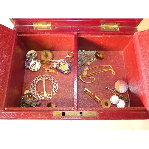 202 - Collection of decorative jewellery and badges to include military-themed badges and buttons, British... 