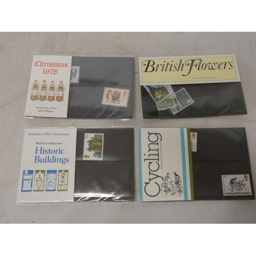 206 - Group of British and Queen Elizabeth II stamp packs to include Scotland, Wales and Northern Ireland ... 