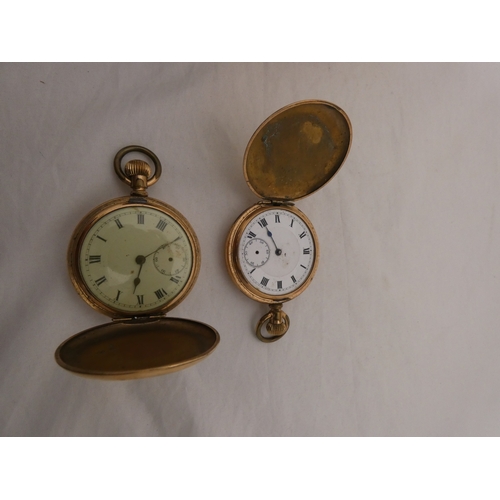 218 - Tin containing watches, jewellery and curios to include two rolled gold full hunter pocket watches, ... 