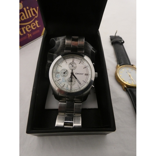 218 - Tin containing watches, jewellery and curios to include two rolled gold full hunter pocket watches, ... 