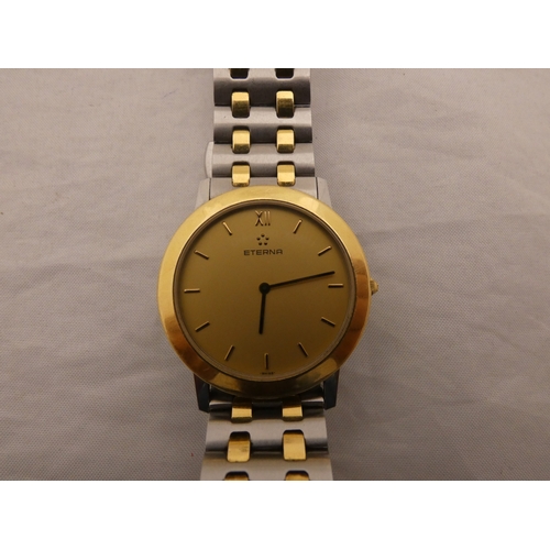 220 - Eterna stainless steel and bi-metal quartz gent's wristwatch, no. 1856.