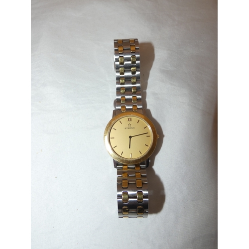 220 - Eterna stainless steel and bi-metal quartz gent's wristwatch, no. 1856.