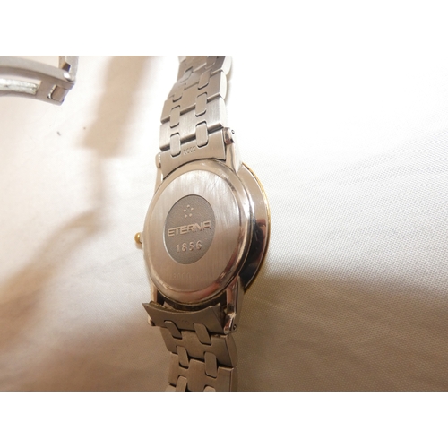 220 - Eterna stainless steel and bi-metal quartz gent's wristwatch, no. 1856.