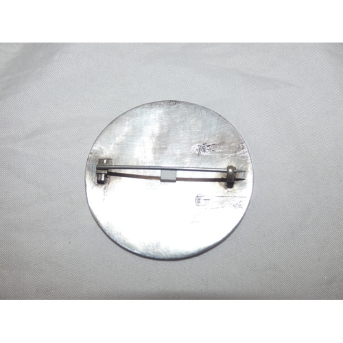 222 - Chinese white metal badge, adapted to a brooch, character marks to the obverse, indistinctly marked ... 