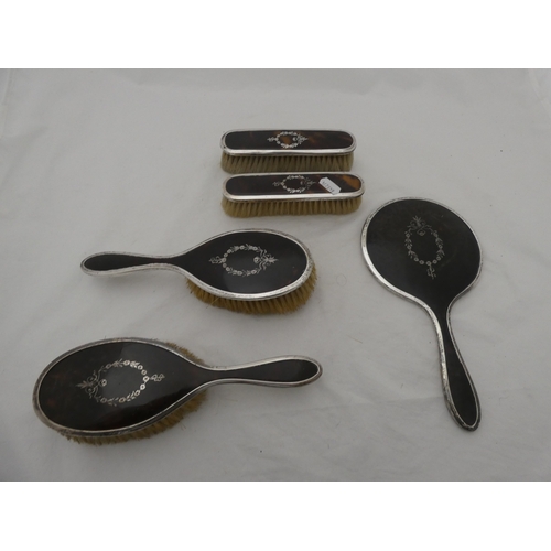 224A - George VI silver and simulated tortoiseshell five-piece brush/mirror set, Birmingham 1946-47.