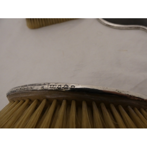 224A - George VI silver and simulated tortoiseshell five-piece brush/mirror set, Birmingham 1946-47.