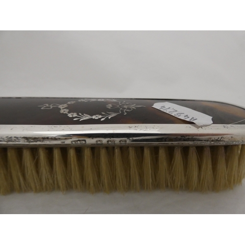 224A - George VI silver and simulated tortoiseshell five-piece brush/mirror set, Birmingham 1946-47.