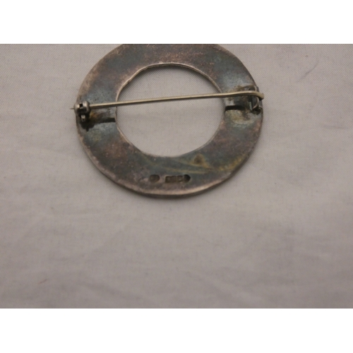 232 - Iona Celtic silver penannular brooch designed by Robert Allison, marks for Glasgow.