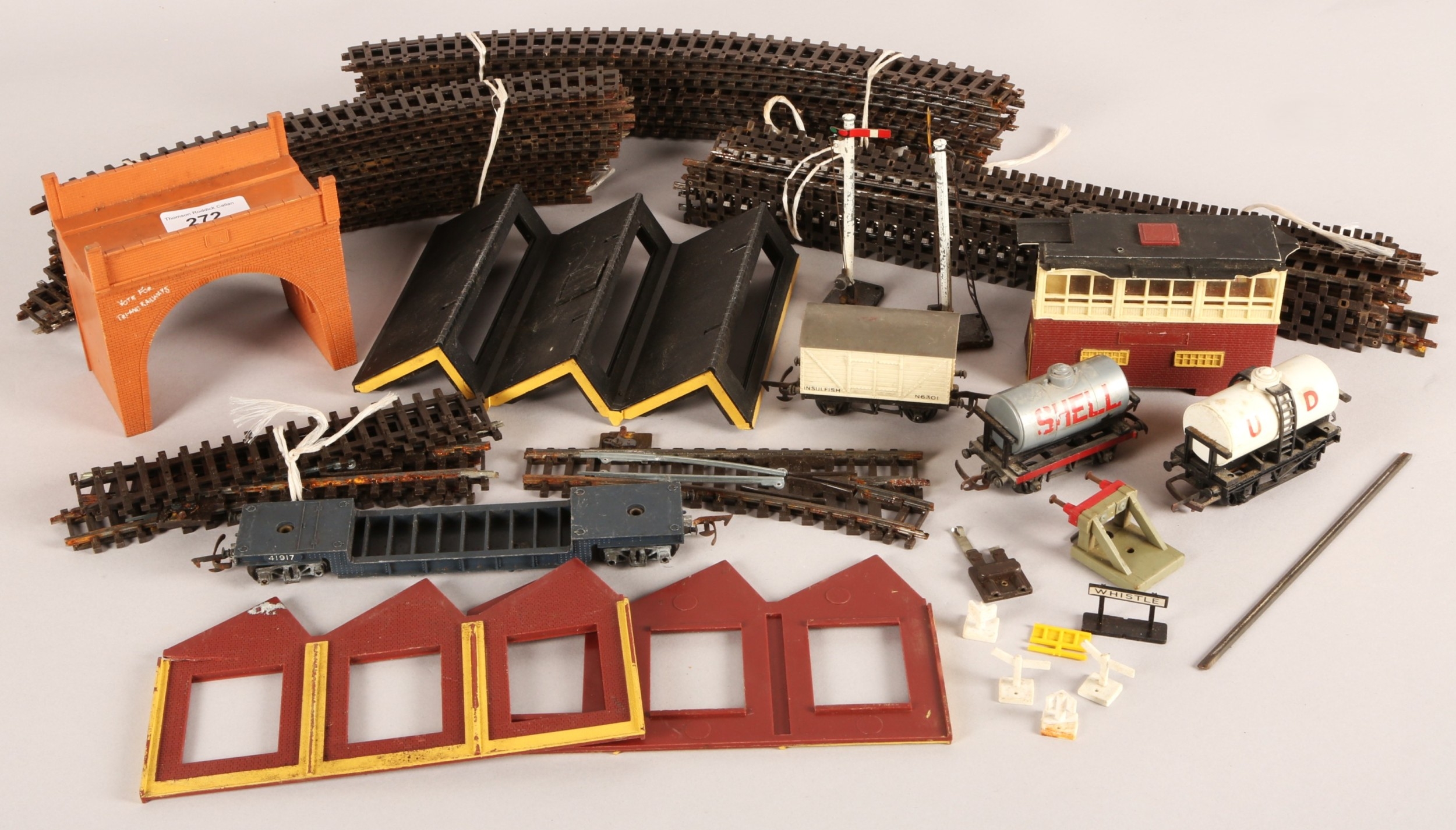 Collection of Tri-ang railway locomotives, track, and accessories.