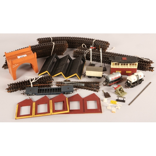 Collection of Tri-ang railway locomotives, track, and accessories.