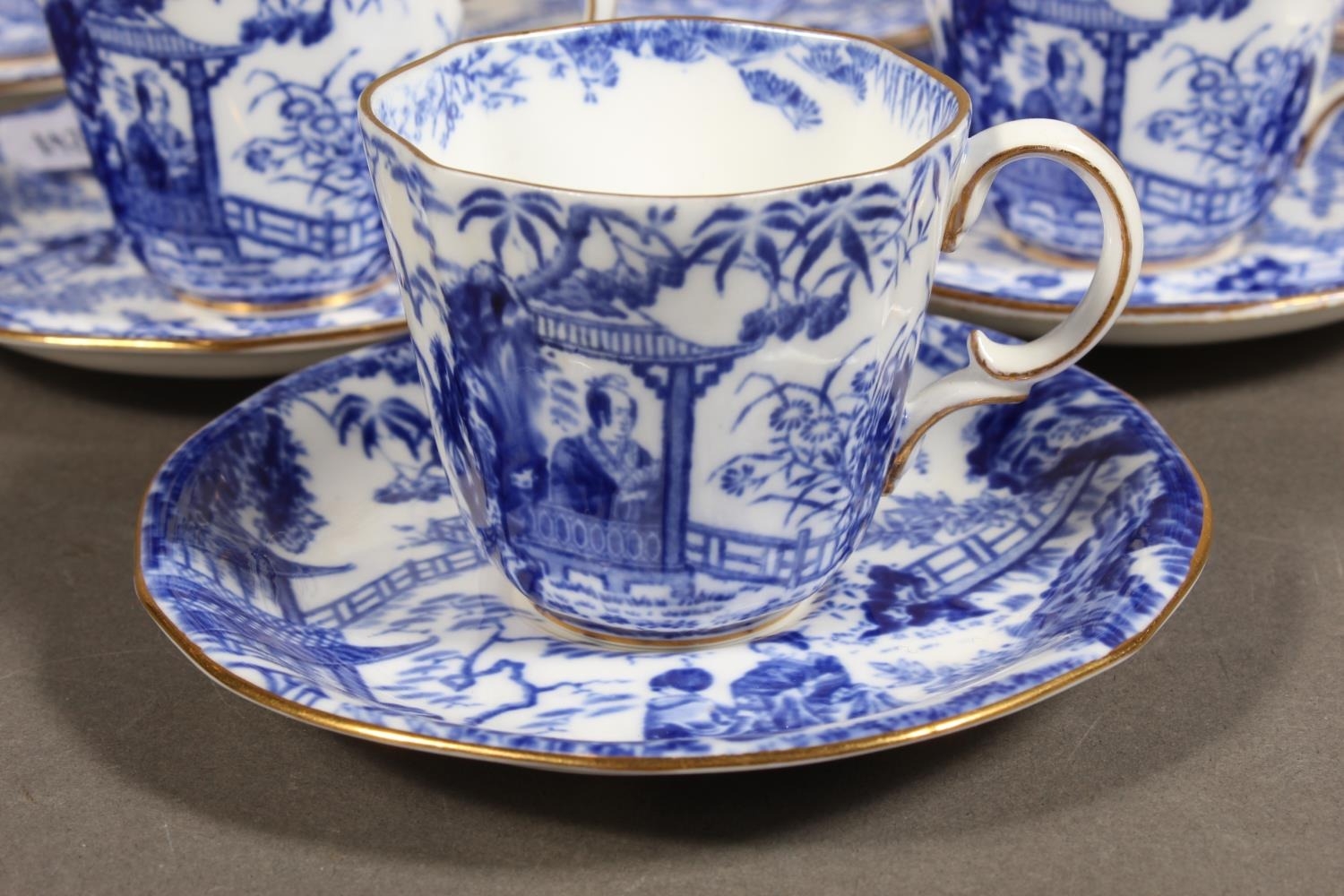 Set of six Royal Crown Derby blue and white teacups and saucers.