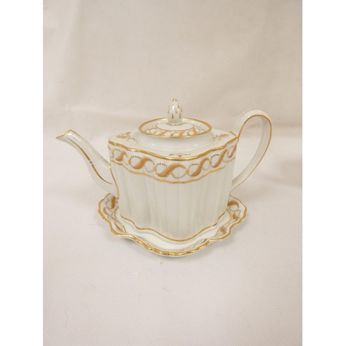 21 - New Hall teapot of silver shape with reeded body and semi-wide loop handle, with matching stand. Pat... 