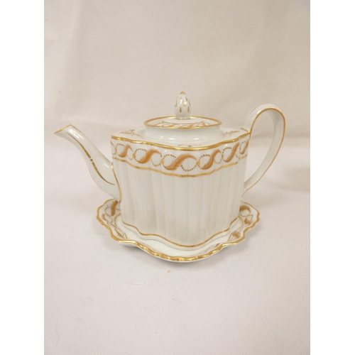 21 - New Hall teapot of silver shape with reeded body and semi-wide loop handle, with matching stand. Pat... 