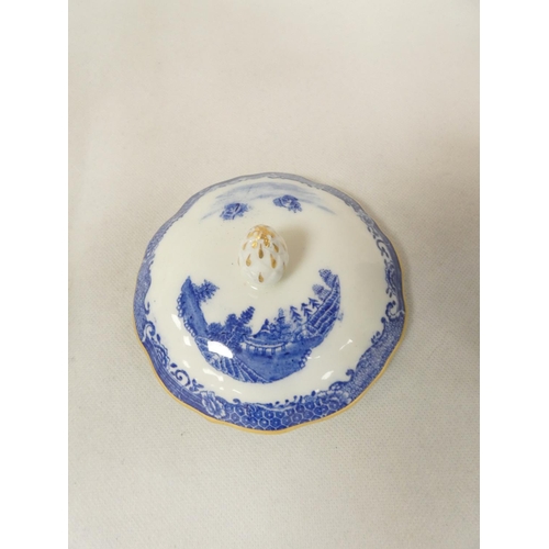 32 - Very rare New Hall sugar box and cover of plain form with flat moulded floral spray finial, blue pri... 