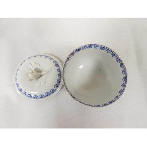 32 - Very rare New Hall sugar box and cover of plain form with flat moulded floral spray finial, blue pri... 