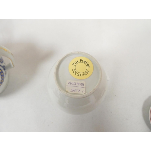 38 - New Hall teapot of spherical form with clip handle, pattern U23, blue and gilt swags, impact damage ... 