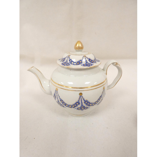 38 - New Hall teapot of spherical form with clip handle, pattern U23, blue and gilt swags, impact damage ... 