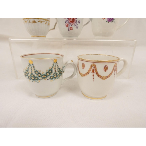 41 - New Hall coffee cup of very rare ribbed form with unusual shaped handle, gilt line and trailing foli... 