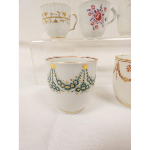 41 - New Hall coffee cup of very rare ribbed form with unusual shaped handle, gilt line and trailing foli... 