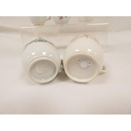 41 - New Hall coffee cup of very rare ribbed form with unusual shaped handle, gilt line and trailing foli... 