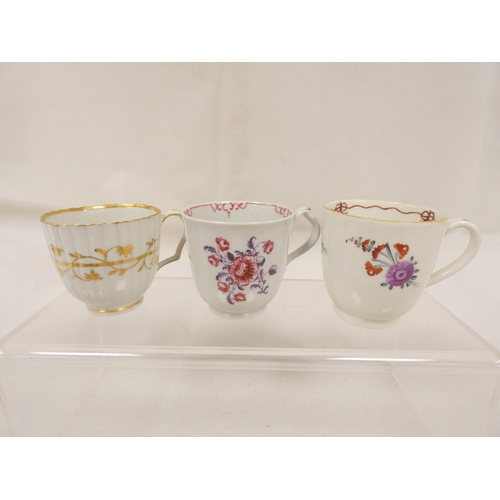 41 - New Hall coffee cup of very rare ribbed form with unusual shaped handle, gilt line and trailing foli... 