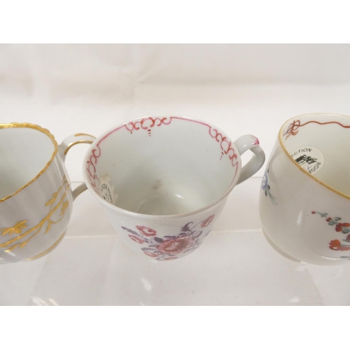 41 - New Hall coffee cup of very rare ribbed form with unusual shaped handle, gilt line and trailing foli... 