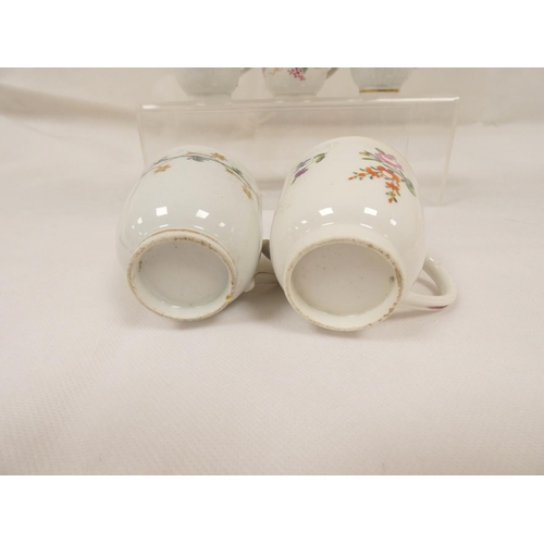 42 - New Hall coffee cup of very rare ribbed form with unusual shaped handle, gilt line and trailing foli... 