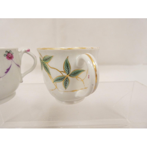 42 - New Hall coffee cup of very rare ribbed form with unusual shaped handle, gilt line and trailing foli... 