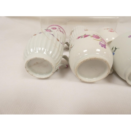 43 - Rare early New Hall coffee cup of corrugated form with double scroll handle, floral sprays with knit... 