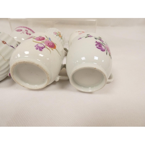 43 - Rare early New Hall coffee cup of corrugated form with double scroll handle, floral sprays with knit... 