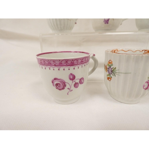 43 - Rare early New Hall coffee cup of corrugated form with double scroll handle, floral sprays with knit... 