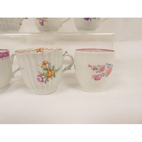 43 - Rare early New Hall coffee cup of corrugated form with double scroll handle, floral sprays with knit... 