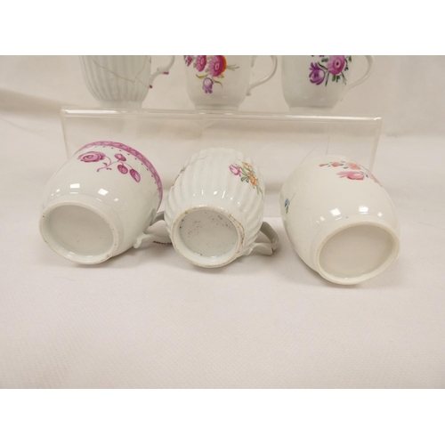 43 - Rare early New Hall coffee cup of corrugated form with double scroll handle, floral sprays with knit... 