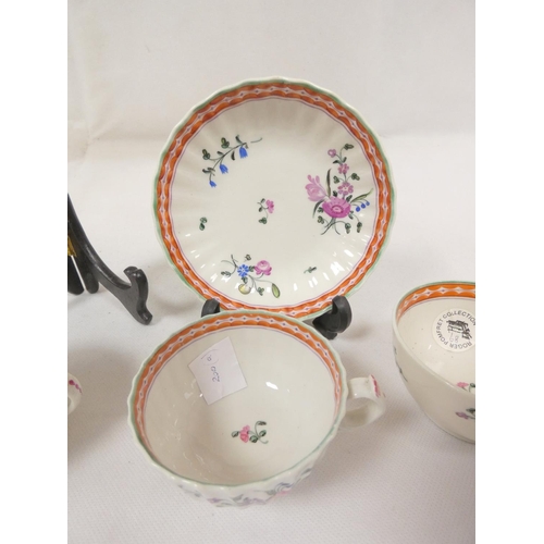 44 - New Hall handled teabowl and saucer with rare backward pointing thumb rest, variant of pattern 3, fl... 