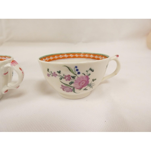 44 - New Hall handled teabowl and saucer with rare backward pointing thumb rest, variant of pattern 3, fl... 