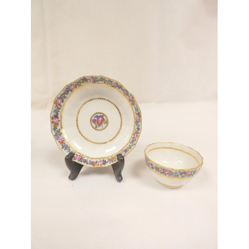 59 - New Hall teabowl and saucer of faceted form, well painted pattern U27, a pale blue band with trailin... 