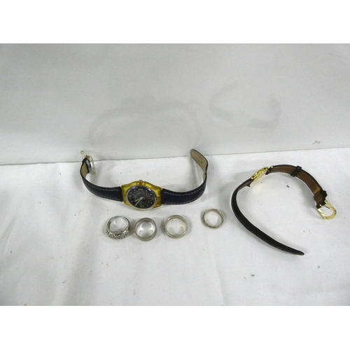 102 - Two fashion watches and four silver rings.