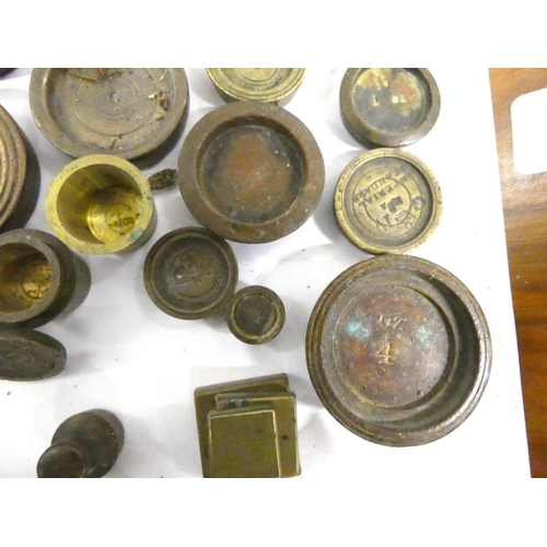 156 - Large collection of George III brass and bronze weights to include bank weights.