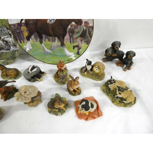 63 - Three Border Fine Arts plates and twenty one Border Fine Arts animal figures to include dogs, cats, ... 