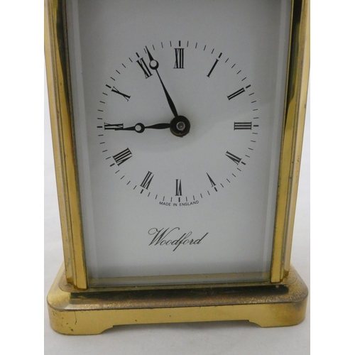 100 - Four glass carriage clock, marked Woodford to the white dial.