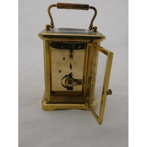 100 - Four glass carriage clock, marked Woodford to the white dial.