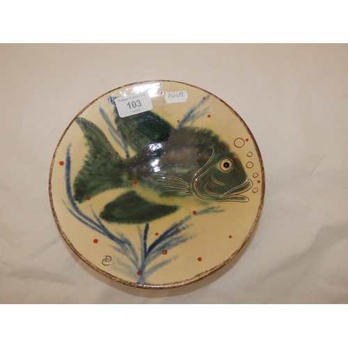 103 - Spanish majolica shallow dish by Puigdemont decorated with a profile of a carp to the well.