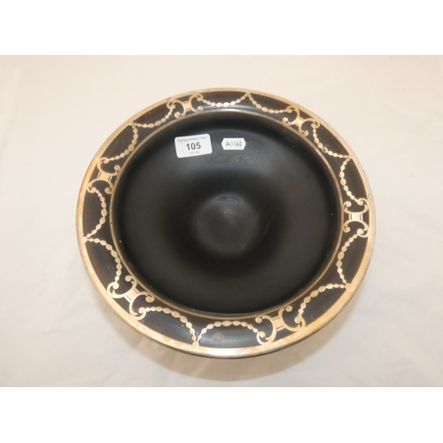 105 - Ebonised overlaid pedestal bowl.